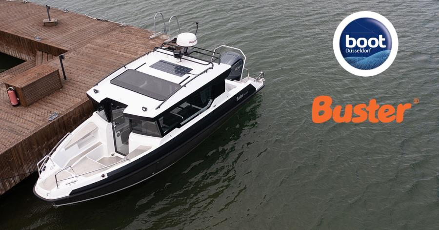 Buster Magnum Cabin cabin boat with aluminium hull attached to a wooden pier